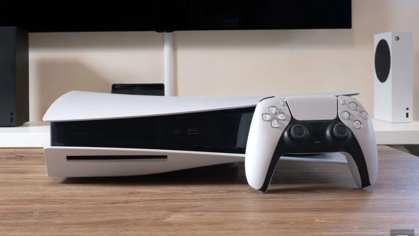 A white gaming console and controller on top of a table.