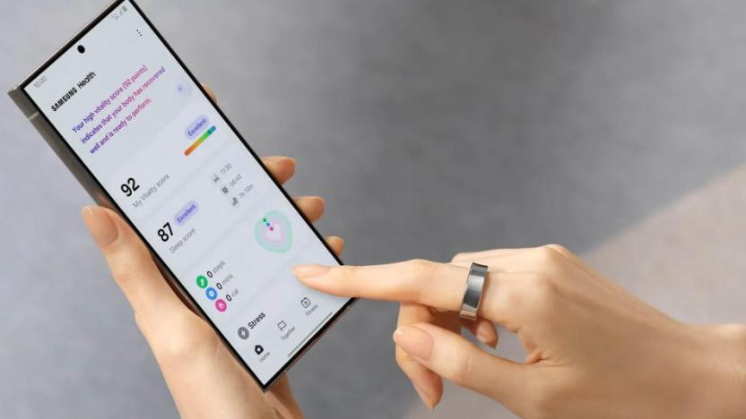 A person accesses their health data on a Samsung smartphone while wearing a Samsung Galaxy ring.