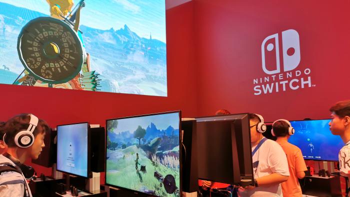 Visitors are seen at a booth of Nintendo Switch at the China Digital Entertainment Expo and Conference, also known as ChinaJoy, in Shanghai, China August 2, 2019.  REUTERS/Pei Li