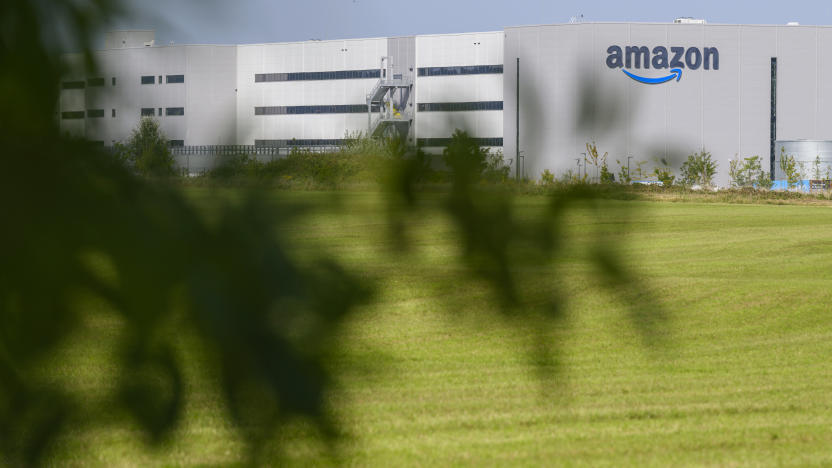 This photograph shows the logo of US multinational company Amazon displaying on the facade of the distribution centre in Augny, near Metz, eastern France, on August 29, 2024. The Augny site, equipped with cutting-edge technology which guarantees the safety and well-being of employees, covers 180,000 square metres and employs around 4,000 people. Amazon reintroduces consumer visits that had been interrupted during COVID19, to rehabilitate its image, damaged by criticism of working conditions in its warehouses. (Photo by Jean-Christophe VERHAEGEN / AFP) (Photo by JEAN-CHRISTOPHE VERHAEGEN/AFP via Getty Images)