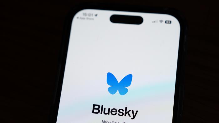 LONDON, ENGLAND - NOVEMBER 22: In this photo illustration, the Bluesky social media platform logo is displayed on an iPhone on November 22, 2024 in London, England. The social media app Bluesky has seen its user base increase by over 5.5 million since the U.S. Presidential elections as some people leave rival X, which is owned by Elon Musk. (Photo by Carl Court/Getty Images)