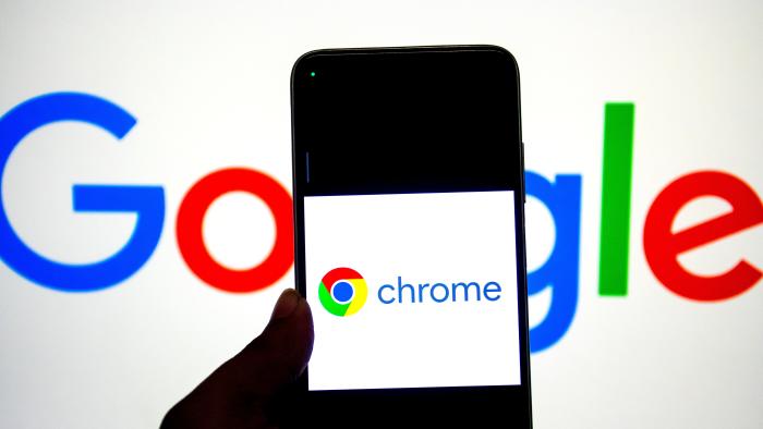 WEST BENGAL, INDIA - 2024/09/14: In this photo illustration, a Google Chrome logo seen displayed on a smartphone with a Google Logo in the background. (Photo Illustration by Avishek Das/SOPA Images/LightRocket via Getty Images)