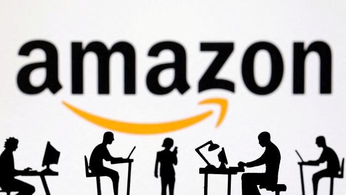 FILE PHOTO: Figurines with computers and smartphones are seen in front of Amazon logo in this illustration taken, February 19, 2024. REUTERS/Dado Ruvic/Illustration/File Photo