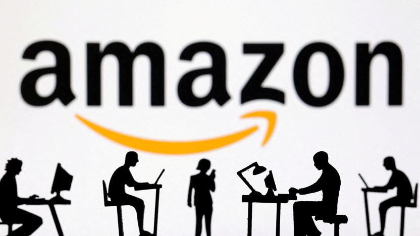 FILE PHOTO: Figurines with computers and smartphones are seen in front of Amazon logo in this illustration taken, February 19, 2024. REUTERS/Dado Ruvic/Illustration/File Photo